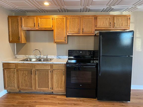 Kitchen - New Stove, Counter, Sink, Faucet, Flooring, Trim