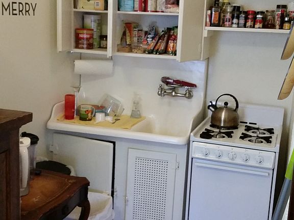 Oven, cabinet space, sink, and storage.