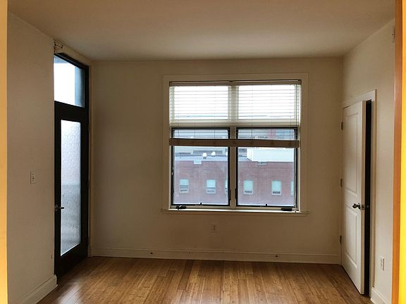 Bedroom. Closet to the right, door to the balcony to the left.