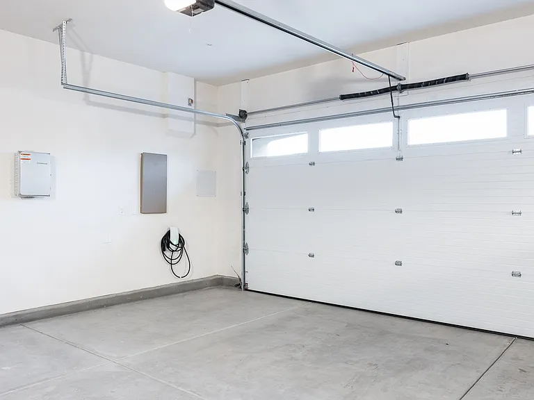 EV Charger is located inside the garage for your convenience!