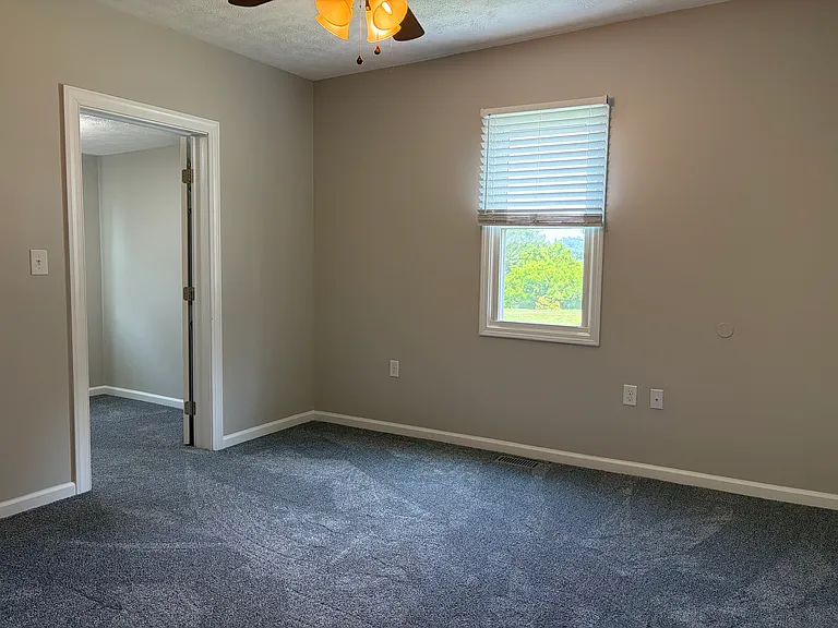 Bedroom 2 with closet and additional oversized multi-purpose spaces