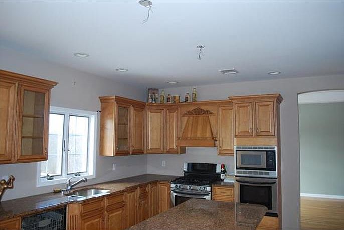 Front of the home that sits perfect on the property to maxamize the light coming into the house