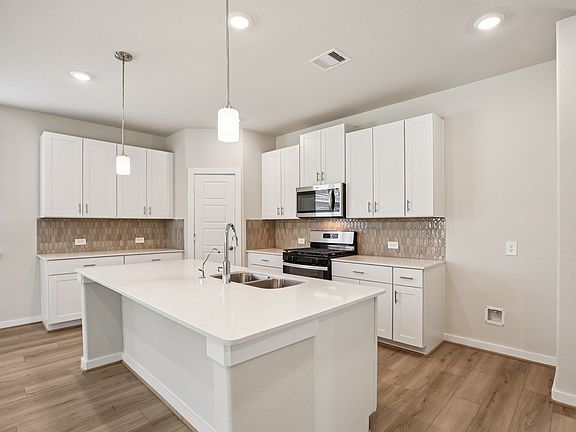 The Texoma floorplan in Pine Lake Cove of Montgomery, TX.