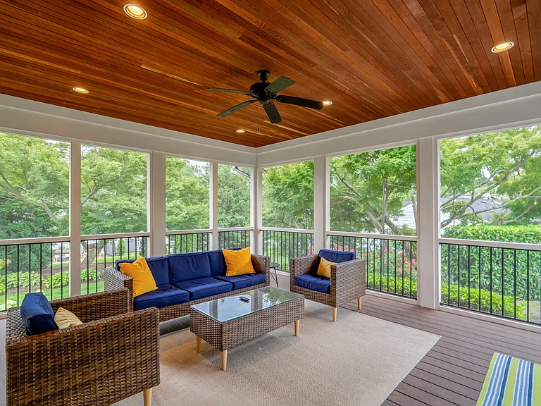 Screened in porch off the kitchen