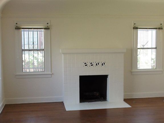 Close up of gas fireplace in living room.