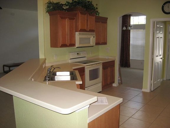 4th image of 8607 Coquina Ave