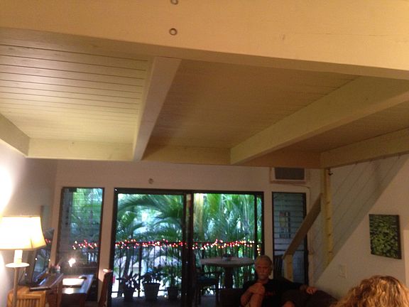 living room w/stairs to loft