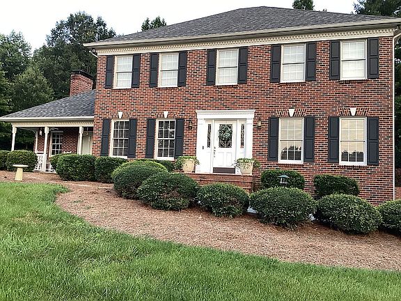 Front view with side porch