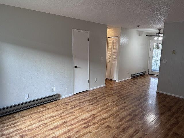 closet on side of living area near kitchen