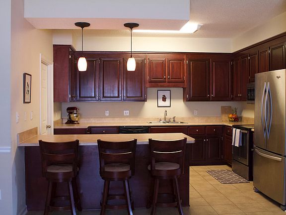 Large, open kitchen with breakfast bar and ample counter space