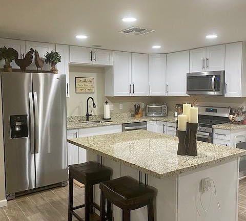 3rd image of 3807 E Surrey Ave