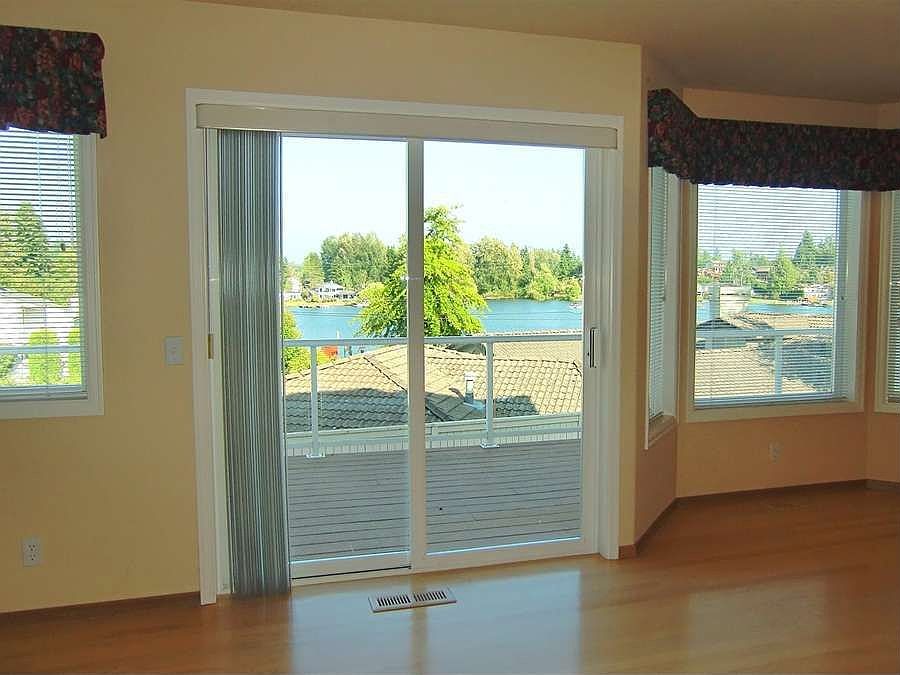 "Glass Sliders off Breakfast Nook to View Deck!"