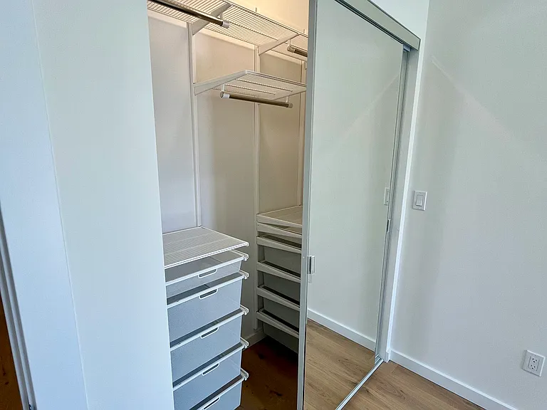 Second Bedroom with built-in Elfa closet system
