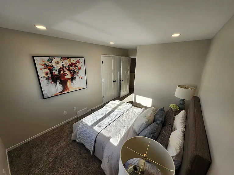 Bedroom two. (Pictures are of another unit with similar finishes and features.)