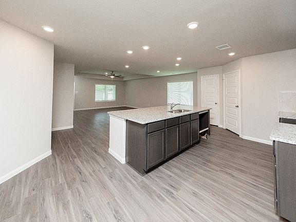 Kitchen to Dining Area and Family Room