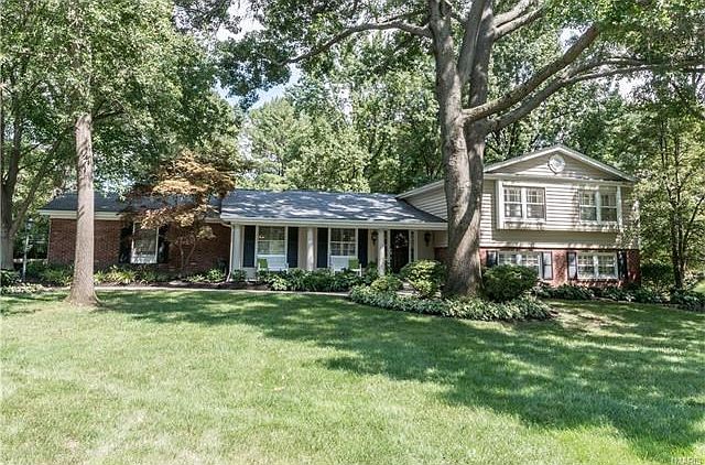 Beautifully landscaped .6+ acre lot