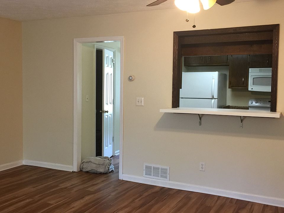 Living room with view to kitchen