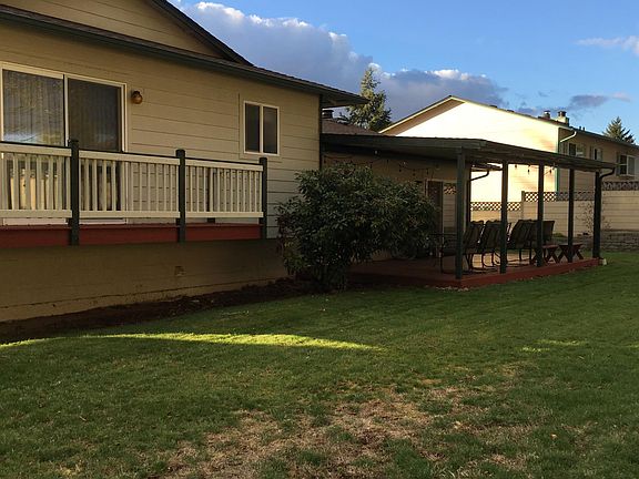 Year yard with master bedroom deck.