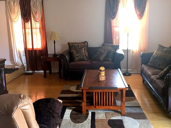 Living room with glistening hardwood floor
