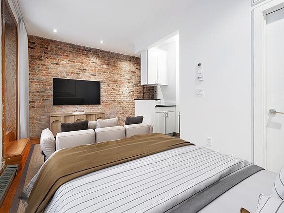 2nd image of 68 Thompson St APT 1C