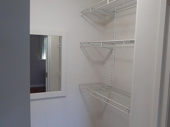 Walk in closet, only 1/2 shows in pic