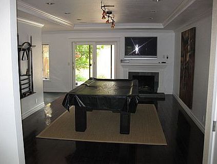 Family Room w/ gas fire place and bar