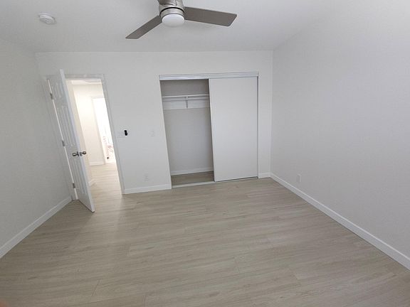bedroom with walking closets