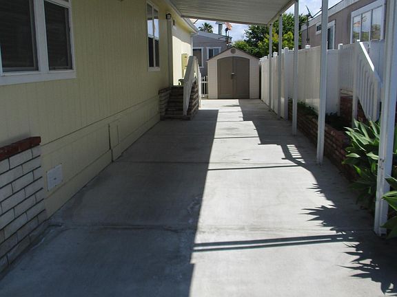 Carport + Storage Shed