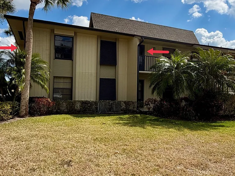 END UNIT w/ spectacular lake & golf course views!
