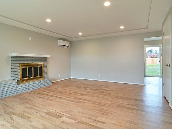 view from front door looking to eating area out to the back yard.