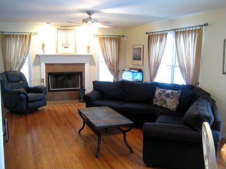 Family room w/woodburning fireplace