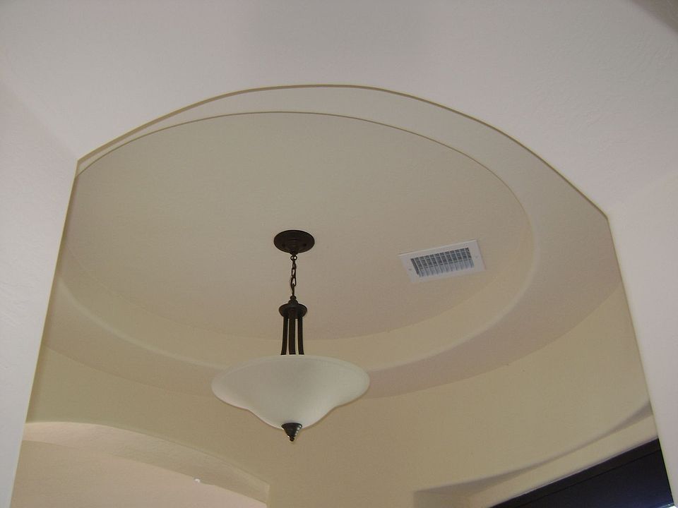 Attention to Detail Coffered Ceilings and Rounded Doorways