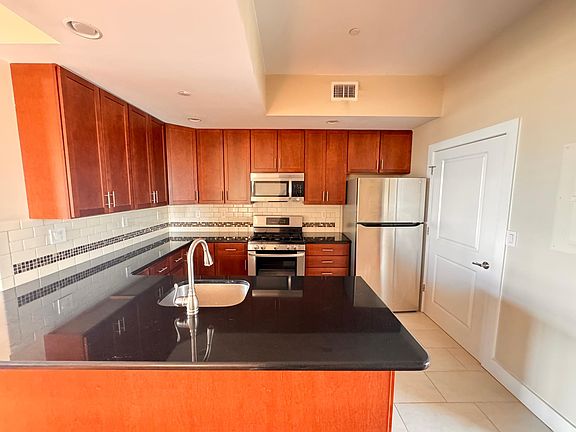 Lots of counter and cabinet space with a pantry!