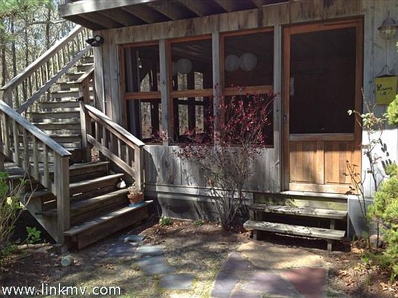Entry either through porch on first floor or stairway to the second level