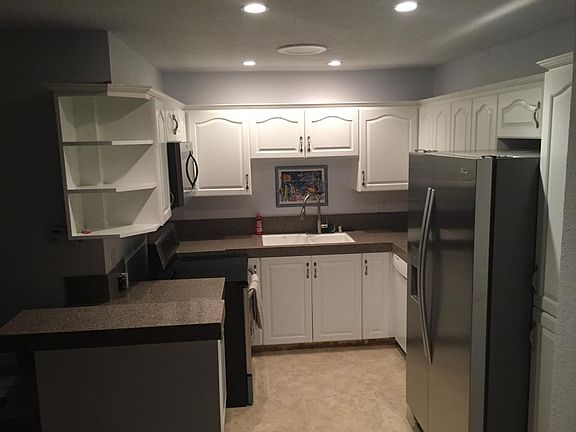 updated kitchen with stainless appliances