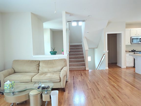 Second floor living area facing the stairway upto third floor