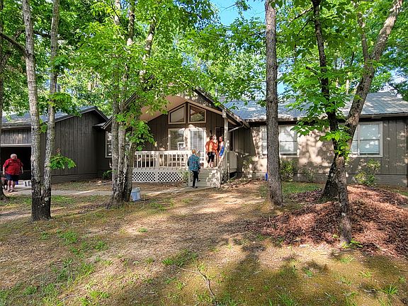 Front of home, two car garage and driveway parking