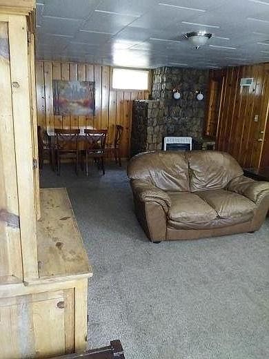 Living room with leather sofa and love seat, Dining room table and chairs, table, china cabinet