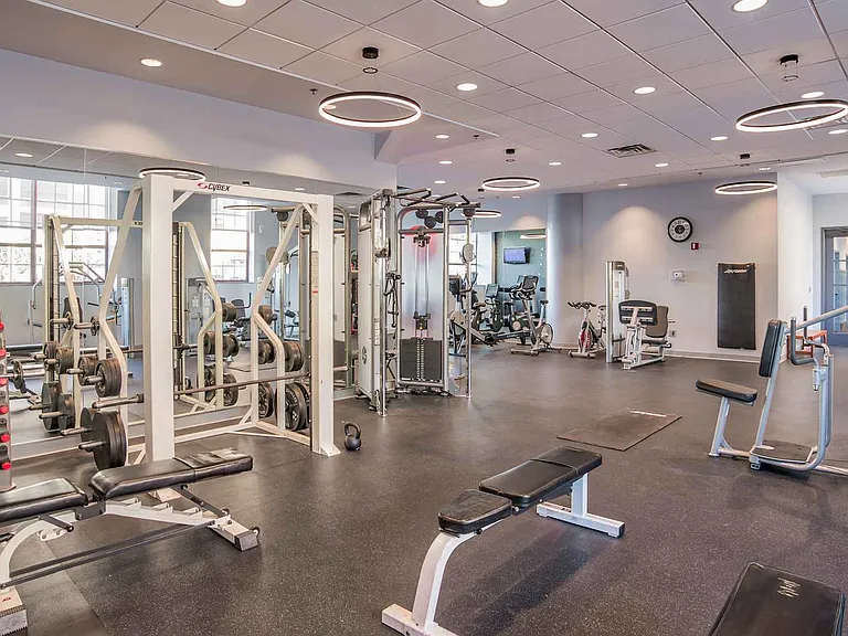 Large fitness center with dedicated weight area