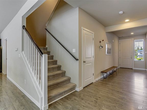 Uncommon in many homes is this very wide hallway from the front door to living room-dining room-kitchen area.