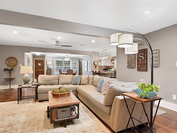 You'll notice how open the view is from the front door into the den, dining room and kitchen.