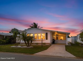 914 Hyacinth Cir, Barefoot Bay, FL 32976