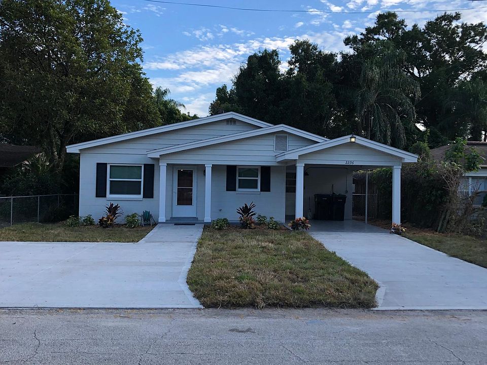 Plenty of parking ! With fresh sod and epoxy flooring in carport and porch