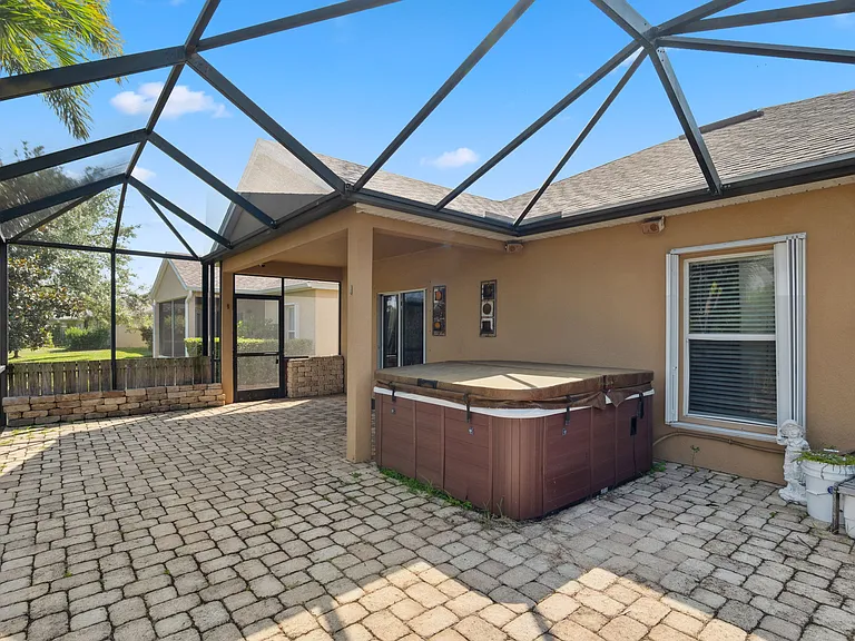 Overall Patio Area showing Covered Porch and Large Screen Enclosure