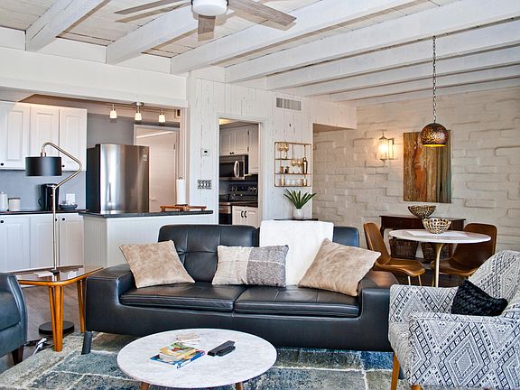 Living room with sofa, side chair and recliner