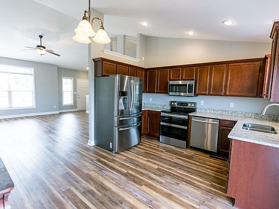 Open Concept Living/Kitchen Space featuring Vaulted Ceilings