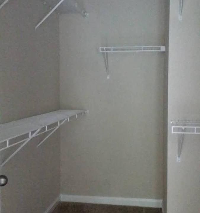 Walk-in closet, main bedroom
