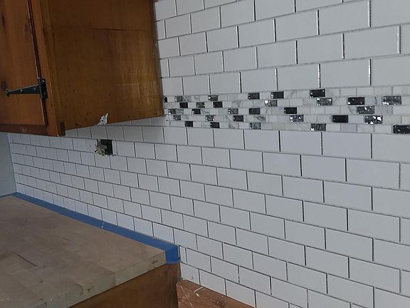 new backsplash and butcher block counter