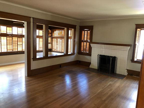 Living room with wood-burning fireplace