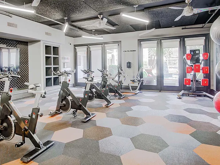 Griffis Uptown fitness center with spin bikes.